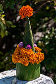 Wat Xieng Thong temple in Luang Prabang, Laos. Offerings to the temple. 